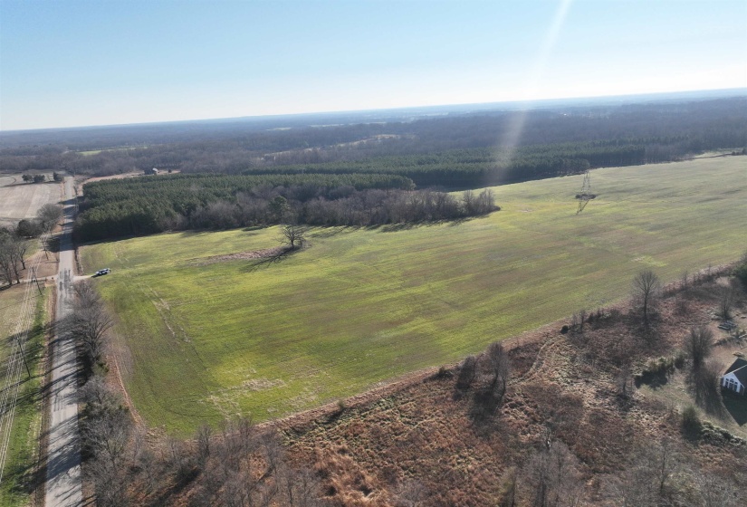 Aerial view of property's location featuring rural landscape and rows of crops