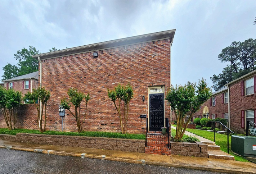 View of front of home with brick siding