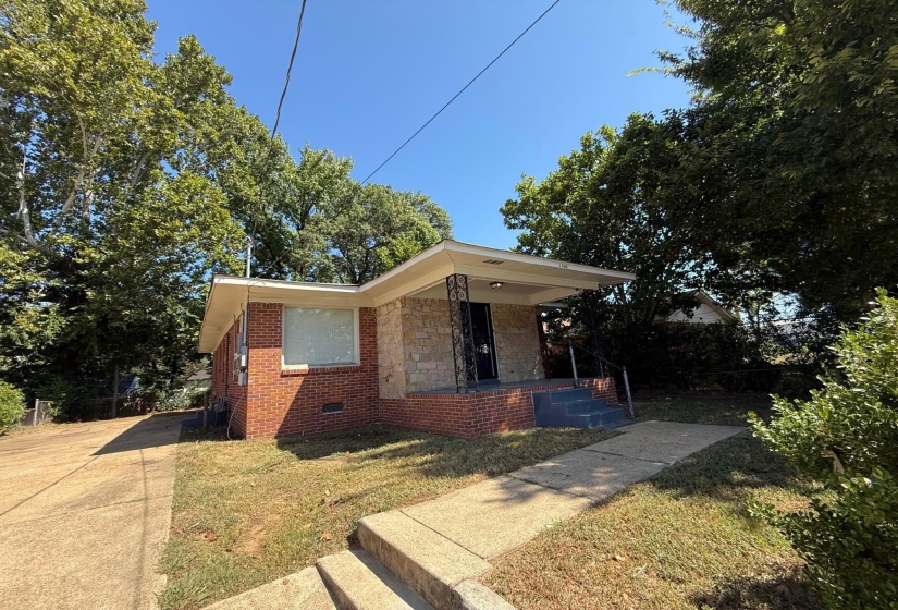 Bungalow featuring crawl space, brick siding, a front lawn, and a porch