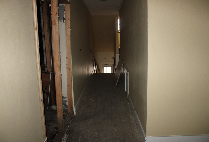 Hall featuring an upstairs landing
