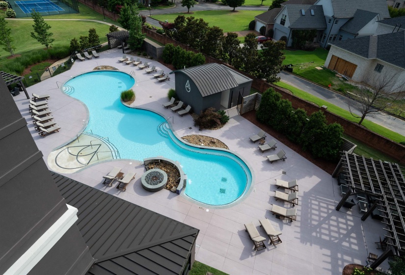 Community pool featuring a patio and a pergola