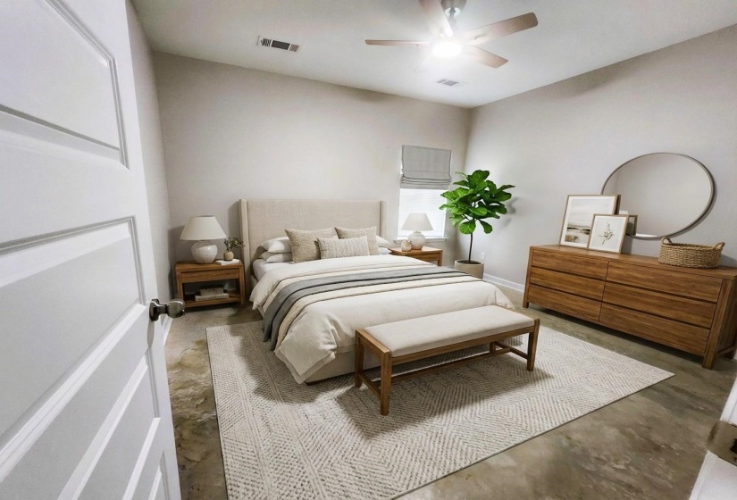 Bedroom featuring a ceiling fan and concrete floors