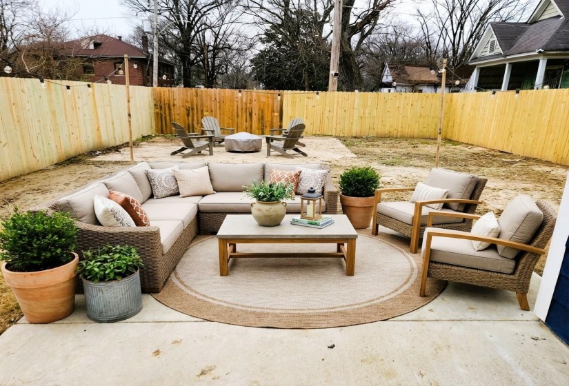 Fenced backyard featuring a nice patio