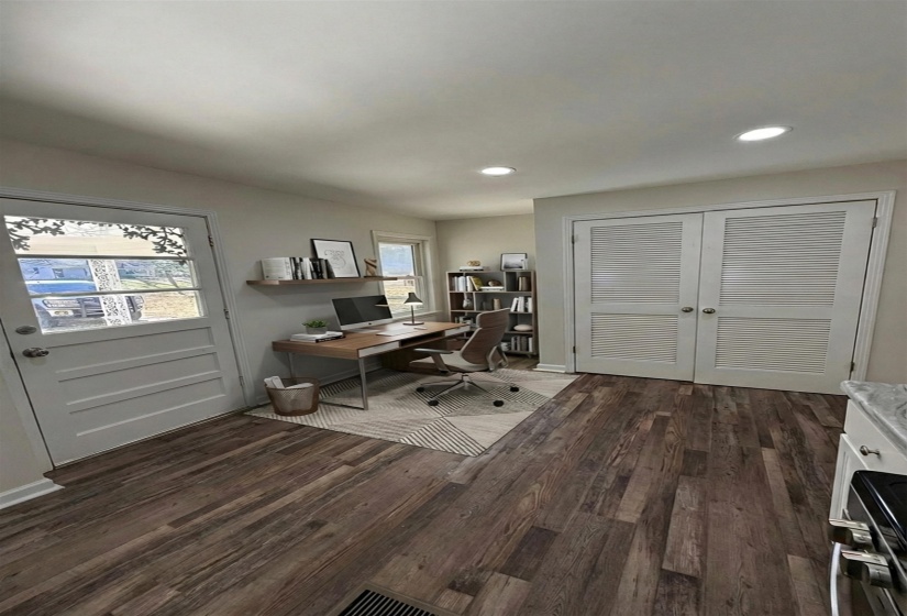 Home office featuring dark wood-style flooring and recessed lighting