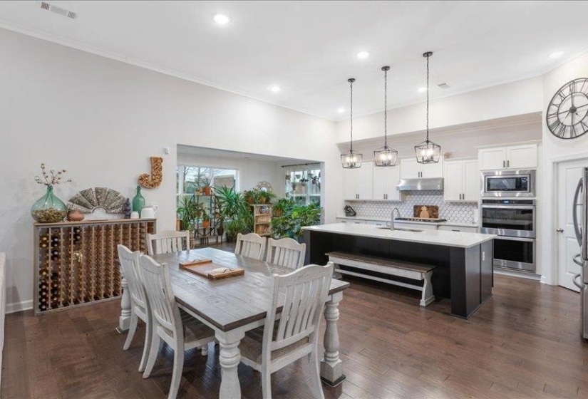 Dining area open to kitchen and main living space.