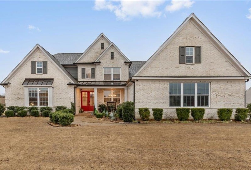 View of front exterior showcasing Scottsdale Elevation A with welcoming double-door entry.