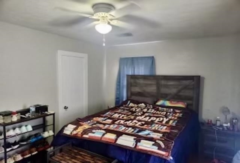 Bedroom featuring ceiling fan
