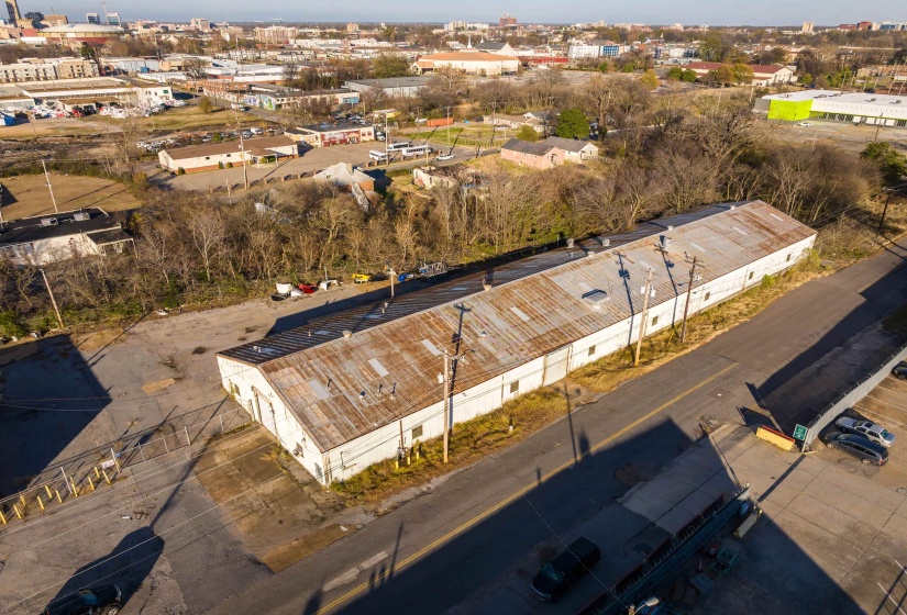 Aerial view of property's location featuring an industrial area