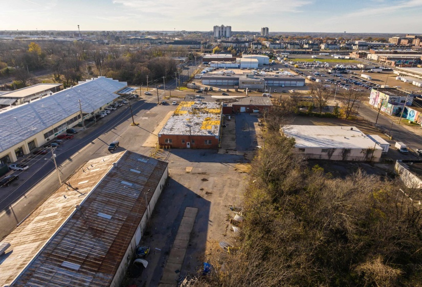 Aerial view of property's location featuring industrial structures