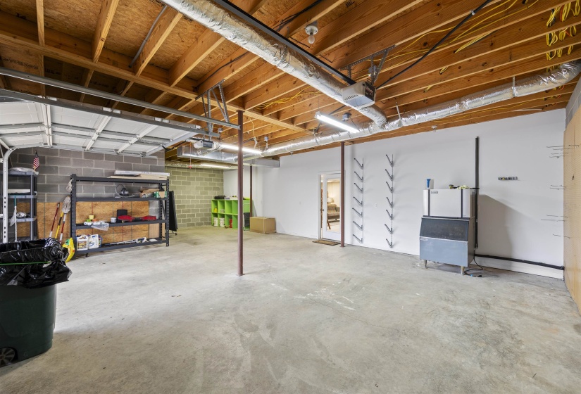 Garage with concrete block wall and a garage door opener