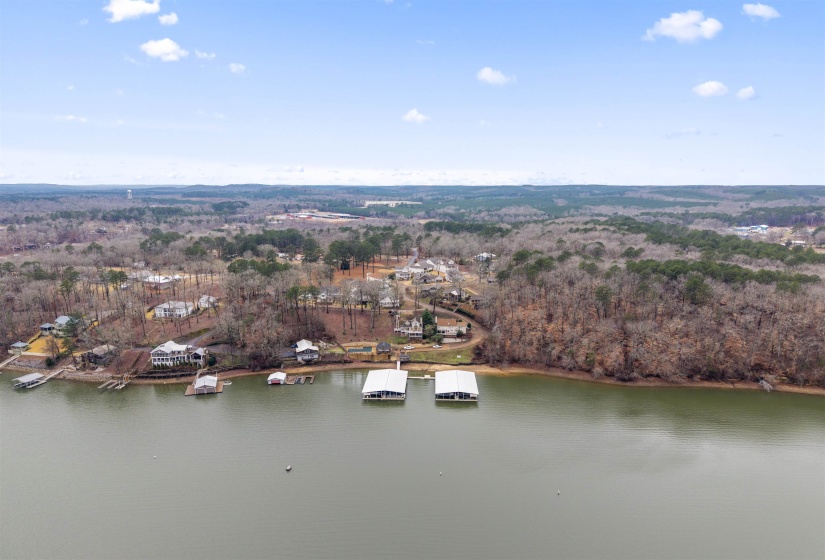 Aerial overview of property's location featuring a nearby body of water