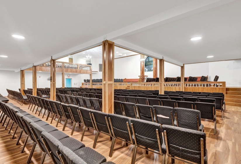 Bar featuring light hardwood / wood-style floors