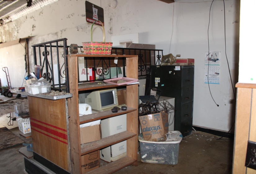 Old drug store, roof has active leak