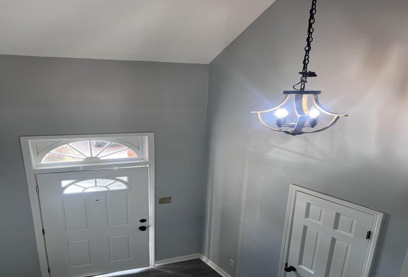 Entrance foyer featuring baseboards