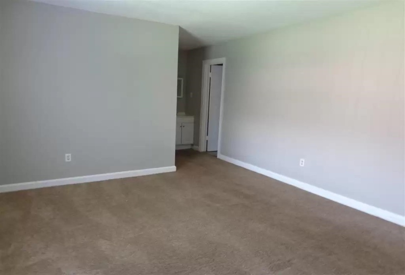 Spare room with carpet flooring and baseboards