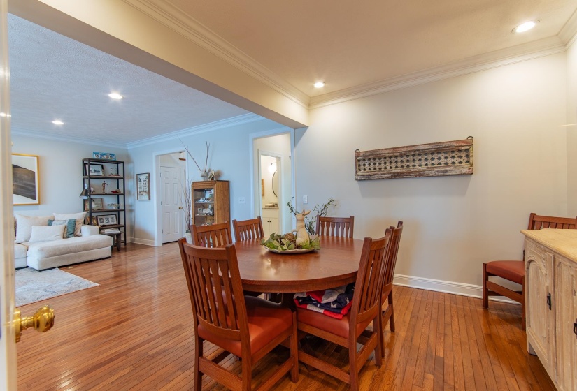 Dining room featuring recessed lighting, baseboards, and hardwood / wood-style flooring
