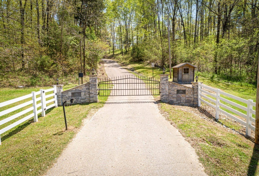 View of gate with a yard