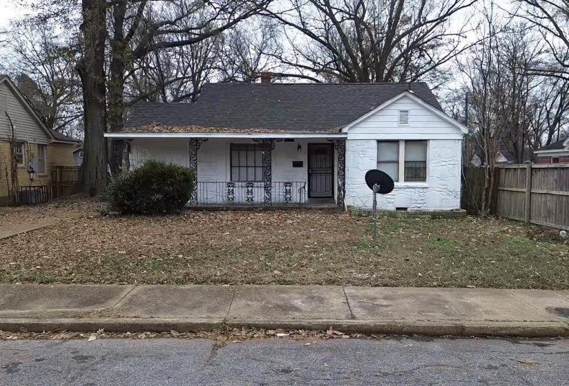 Bungalow-style house featuring a porch and roof with shingles