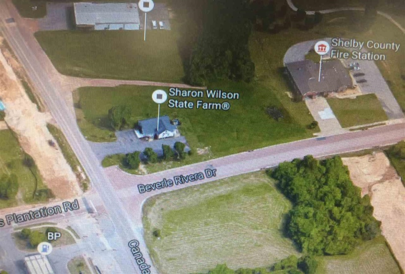 Aerial overview of property's location featuring property parcel outlined