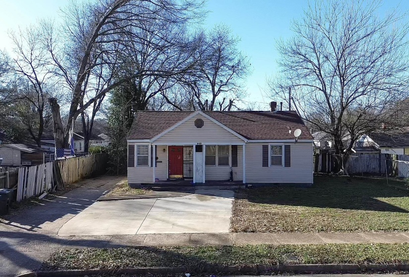 View of front of property with a shingled roof