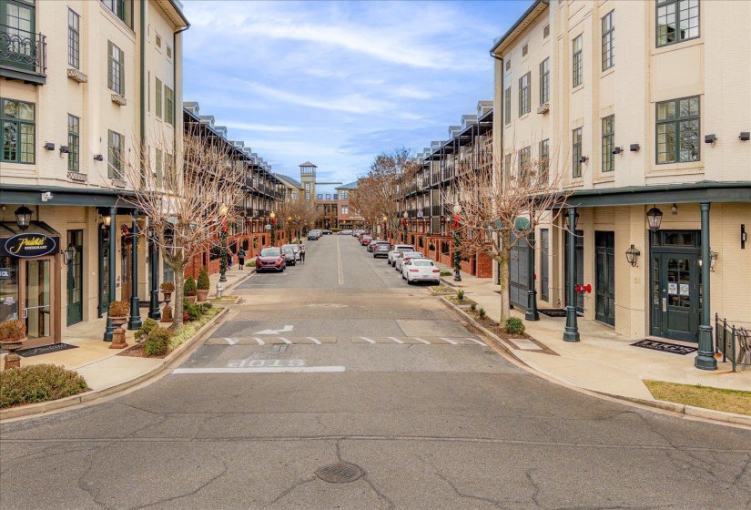 View of road with sidewalks, curbs, and street lighting