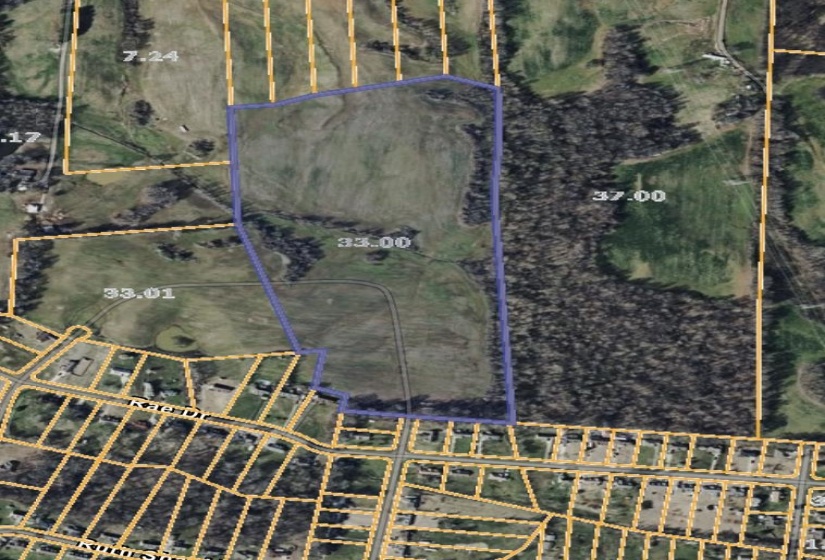 Aerial overview of property's location featuring property boundaries highlighted