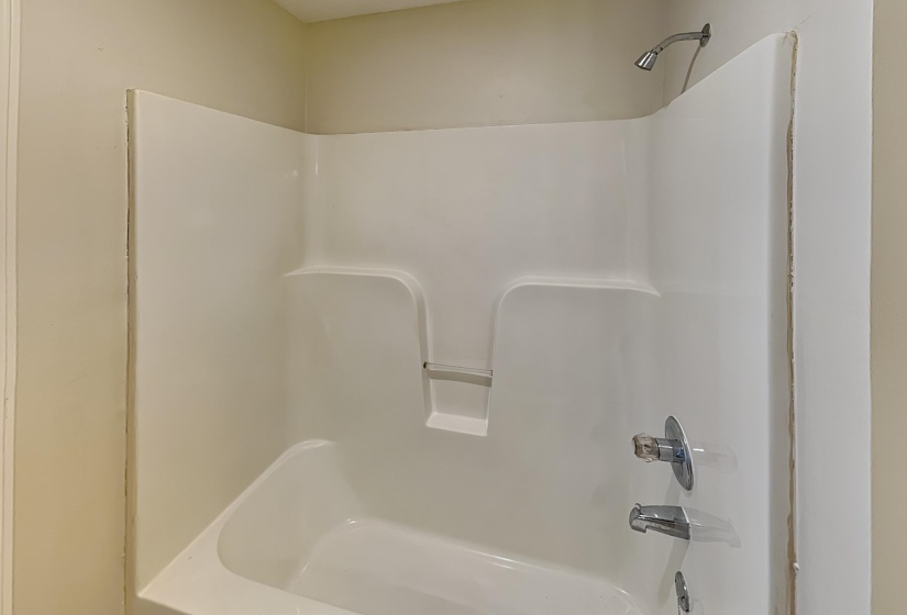 Bathroom with shower / bath combination