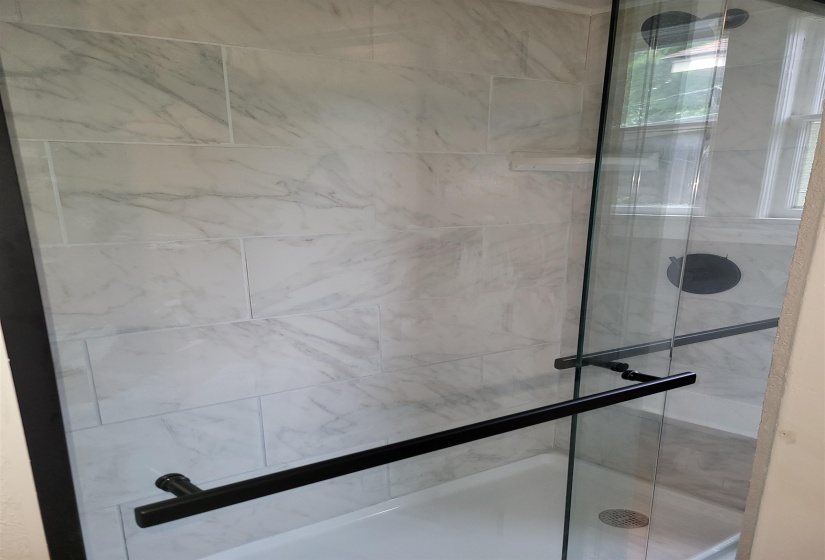 Bathroom view of a shower stall