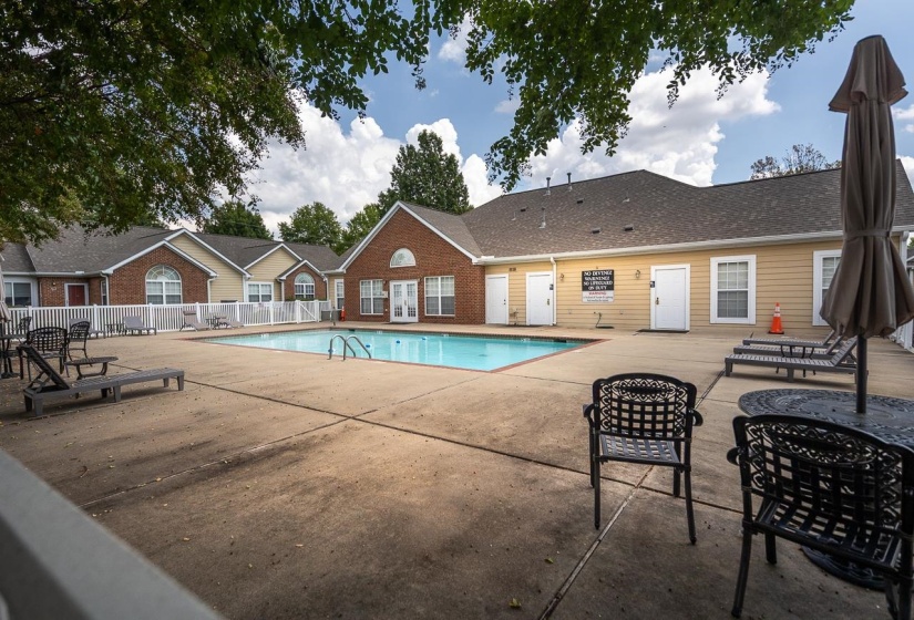 Community pool featuring a patio area