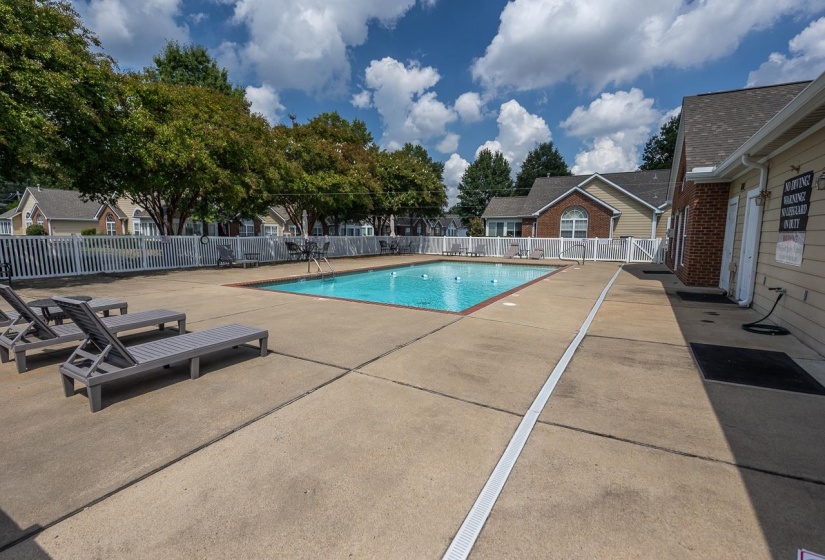 Community pool featuring a patio area