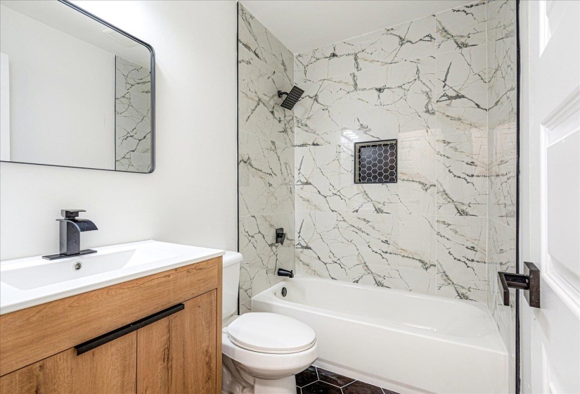 Full bathroom with  shower combination and vanity
