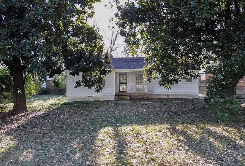 Obstructed view of property featuring crawl space and covered porch
