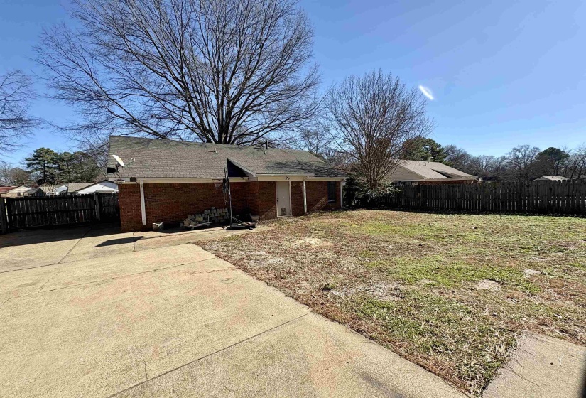 View of fenced backyard
