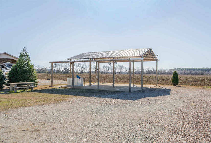 View of community featuring a patio area and a view of rural / pastoral area