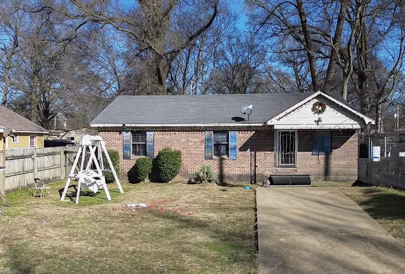 View of front of home with brick siding