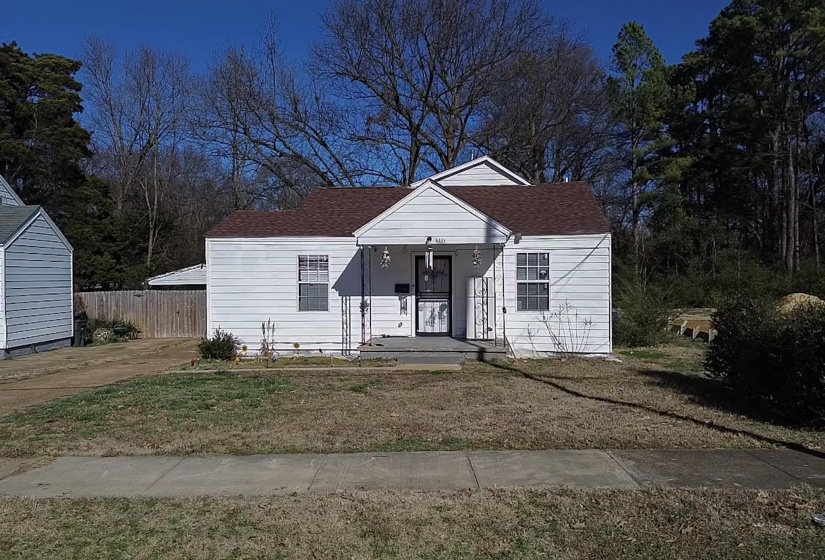 Bungalow-style home featuring covered porch and roof with shingles