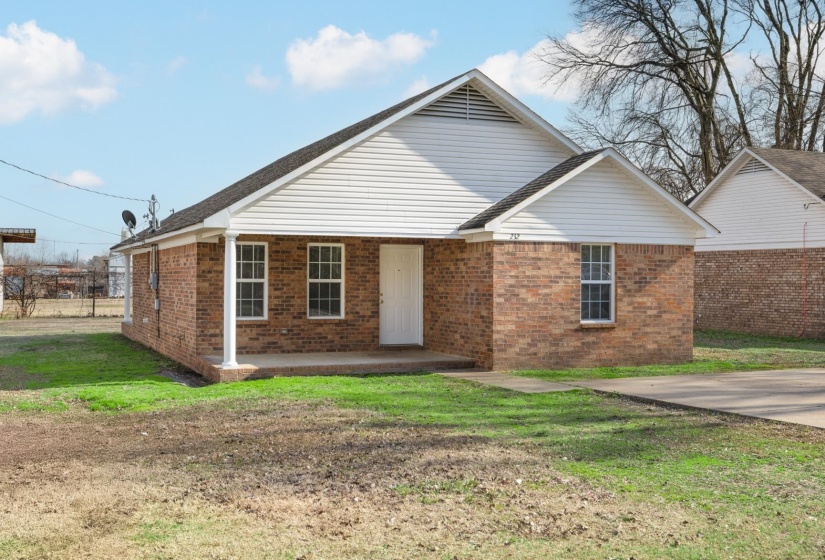 View of front of property with brick exterior.