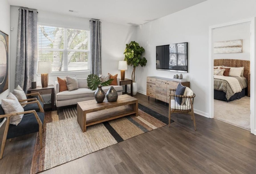 Living area featuring dark wood finished floors