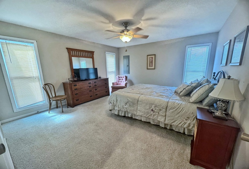 Carpeted interior room featuring light-toned walls