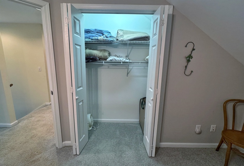 Closet with bi-fold doors and wire shelving
