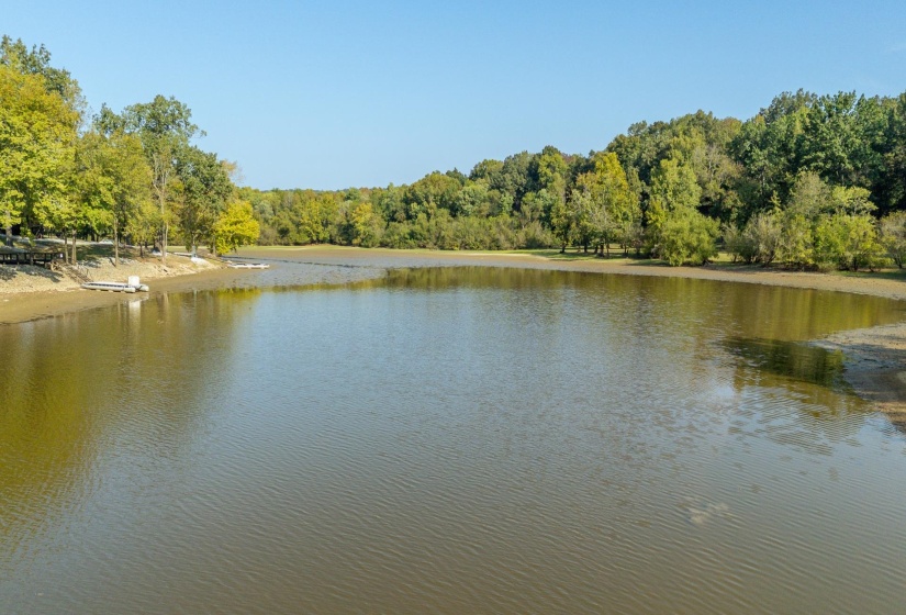 Water view featuring a heavily wooded area