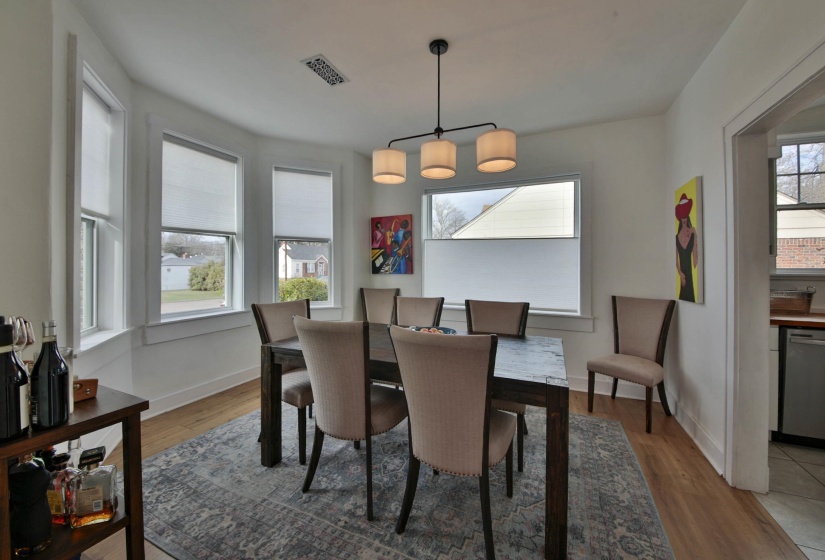 Dining room featuring baseboards and light wood finished floors