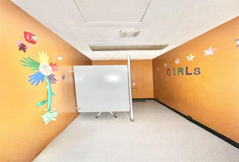 Misc room featuring a textured ceiling