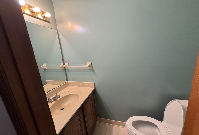 Bathroom featuring vanity and light tile patterned floors