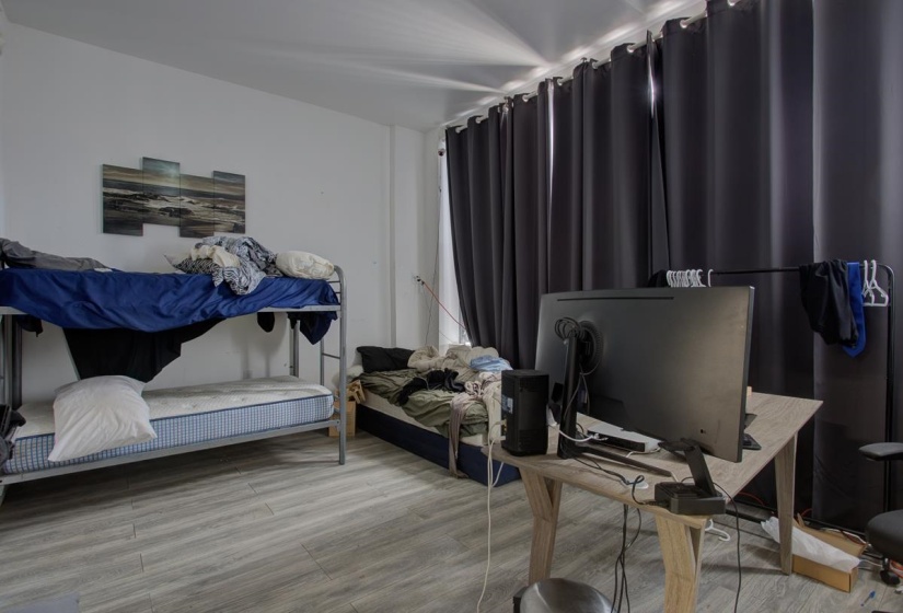 Bedroom featuring light wood-style floors