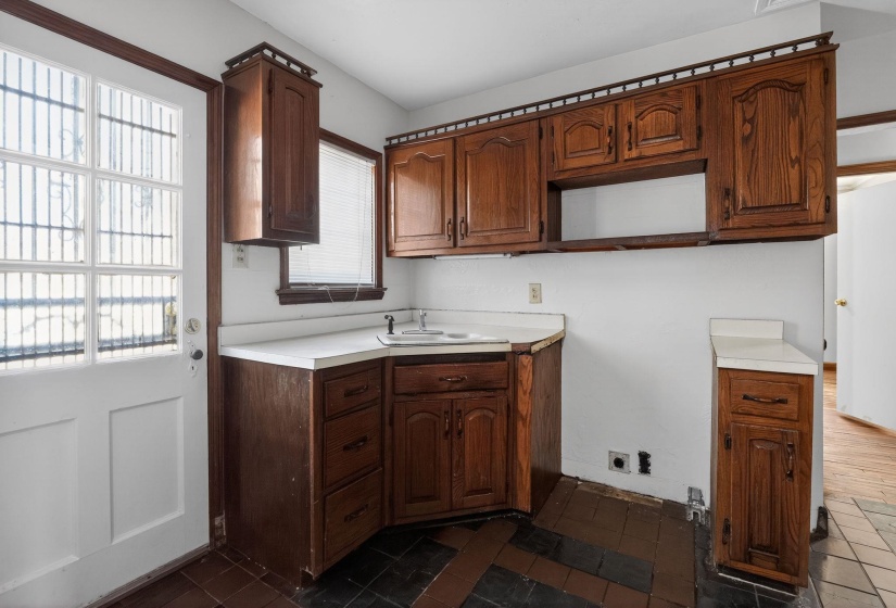 Laundry room with hookup for an electric dryer and a sink