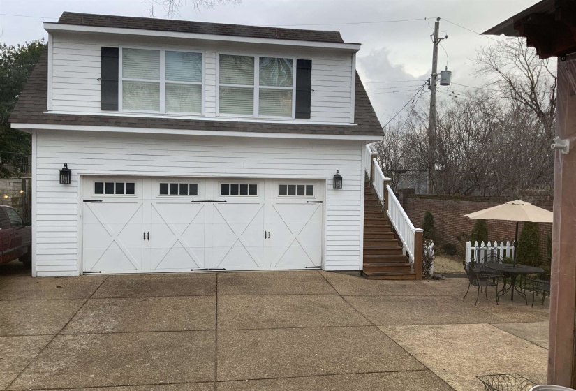 Garage with concrete driveway