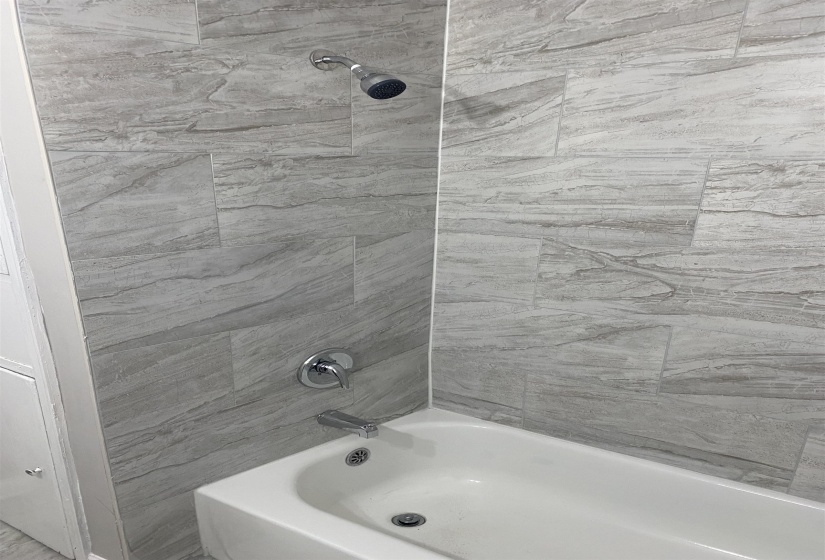 Bathroom featuring shower / bath combination