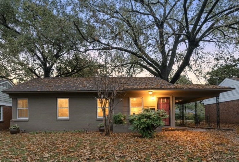 Entrance to property with brick siding