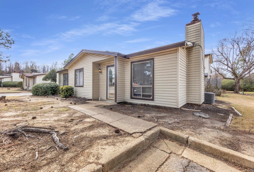 View of front of house featuring a chimney